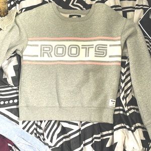 I bought it but never worn it but did take the tag off. Grey roots crew neck.